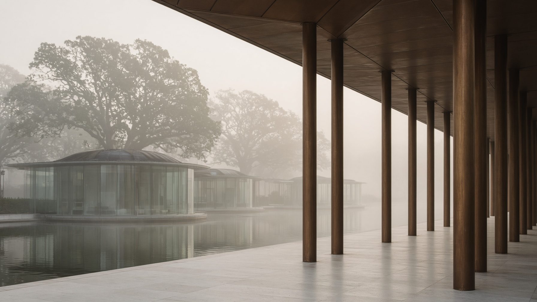 A colonnade of slender bronze columns beside still water at dawn.
